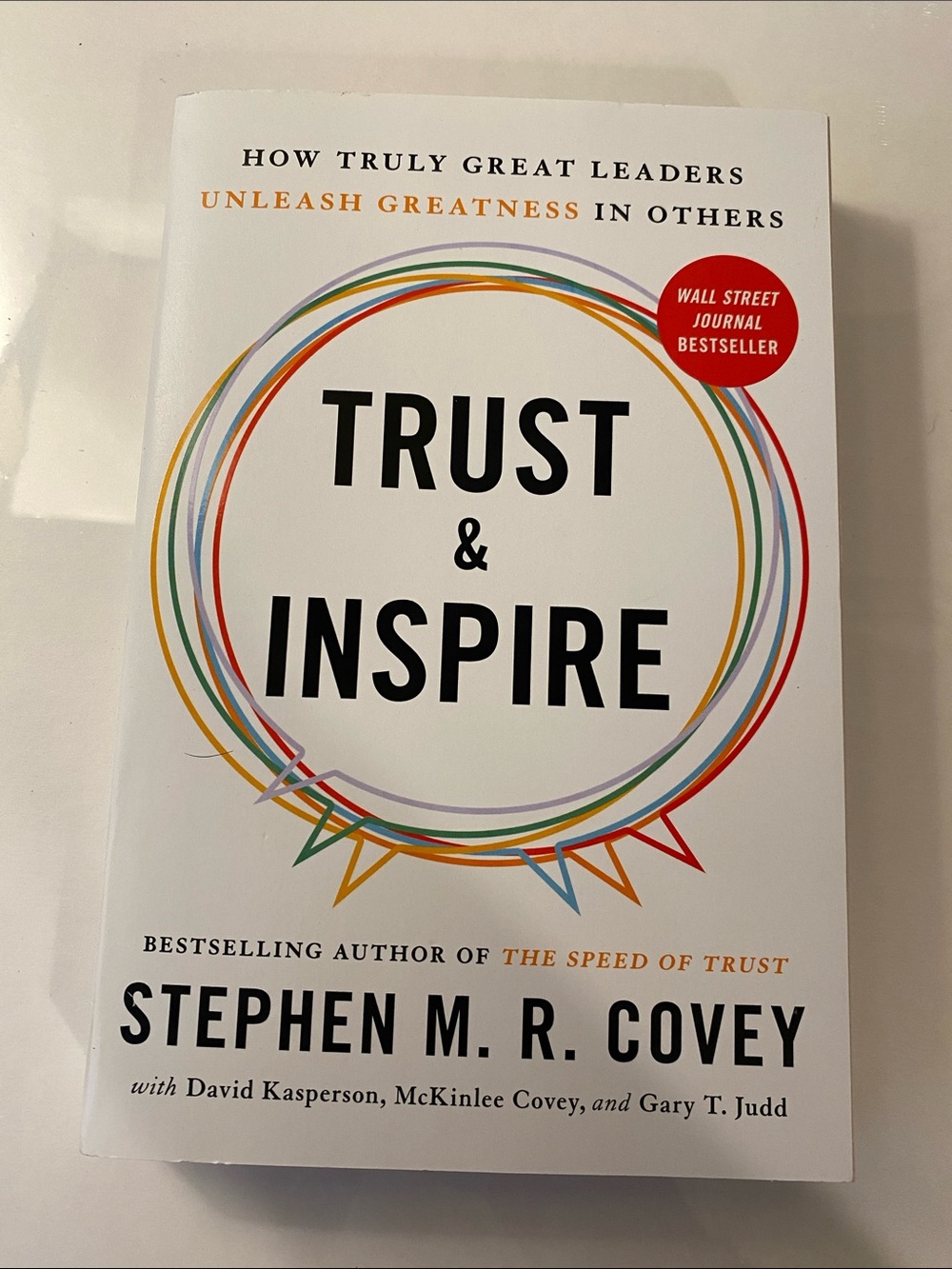 Trust & Inspire by Stephen M. R. Covey - White Cover with Multicolor Circle